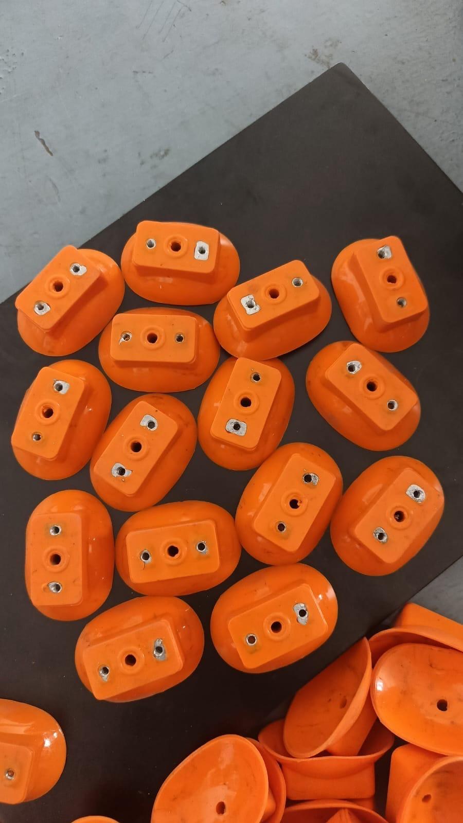 Orange moulded suction-related components